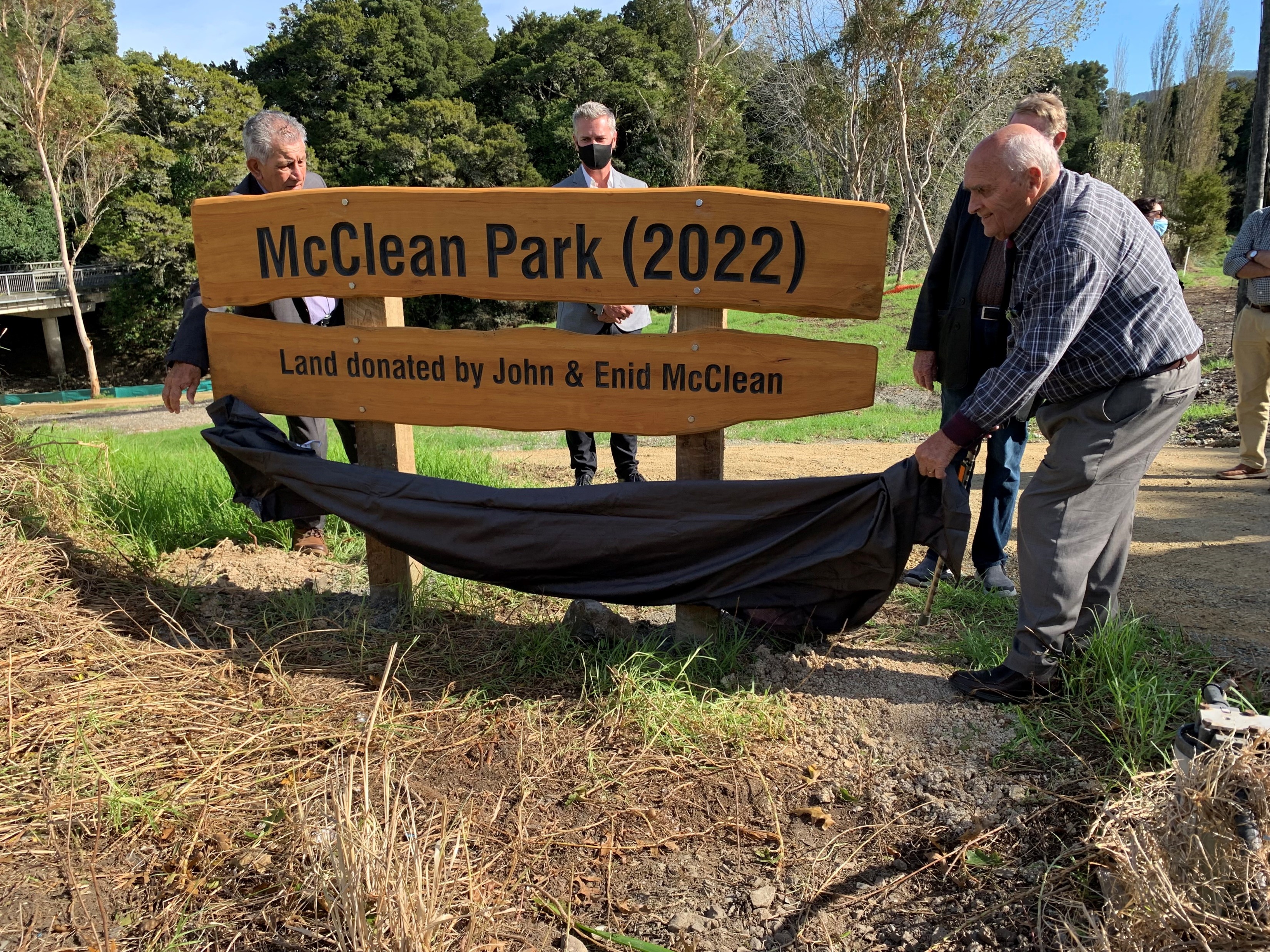 John McClean is unveiling a sign noting the land he and his wife have donated to the Kaiwaka community